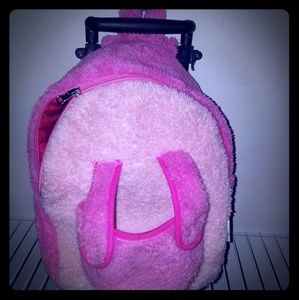 Girls pink bag with wheels